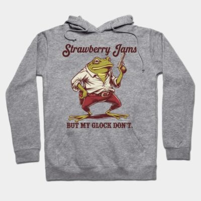 Gray hoodie with a humorous frog graphic and text, "Strawberry Jams But My Glock Don't," casual and stylish design.