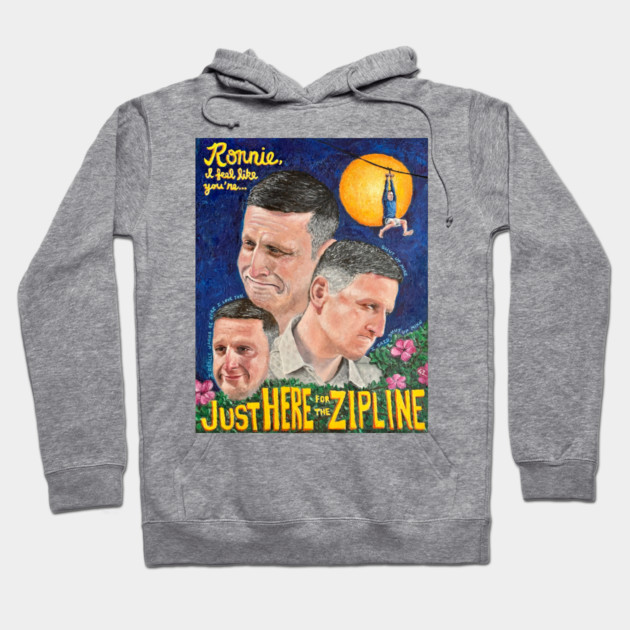 Gray hoodie with colorful graphic design, featuring text "Just Here for the Zipline." Casual, comfortable style.
