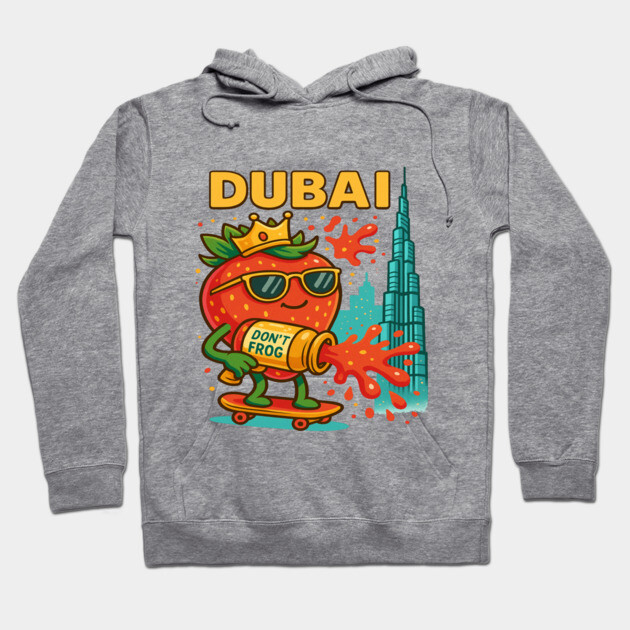 Gray hoodie with colorful Dubai-themed cartoon print, featuring a skateboarding character and cityscape design.