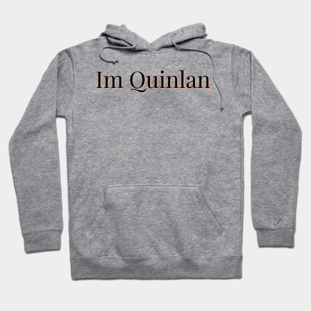 Gray hoodie with "Im Quinlan" text, featuring a front pocket and drawstring hood, perfect for casual wear.