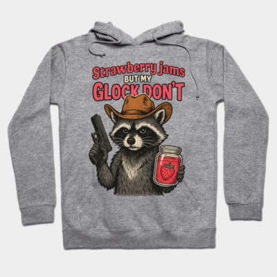 Gray hoodie with raccoon graphic, cowboy hat, holding jam jar and toy gun, text "Strawberry jams but my Glock don't".