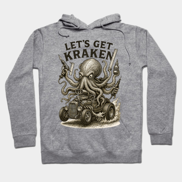 Gray hoodie with "Let's Get Kraken" graphic, octopus driving a car, casual style, comfortable cotton blend material.