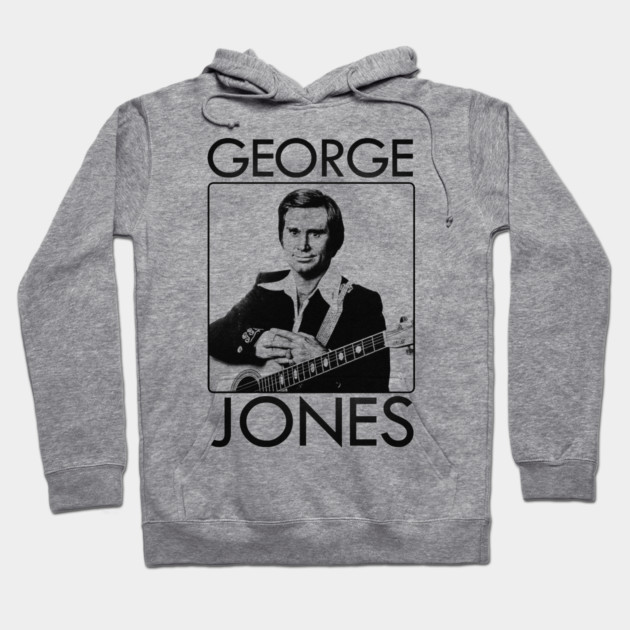 Gray hoodie featuring vintage musician graphic and bold text, perfect for casual wear and music fans.