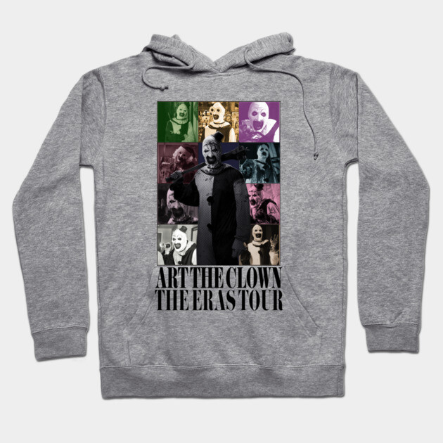 Gray hoodie featuring colorful clown collage design with text "Art the Clown The Eras Tour." Casual and comfortable style.