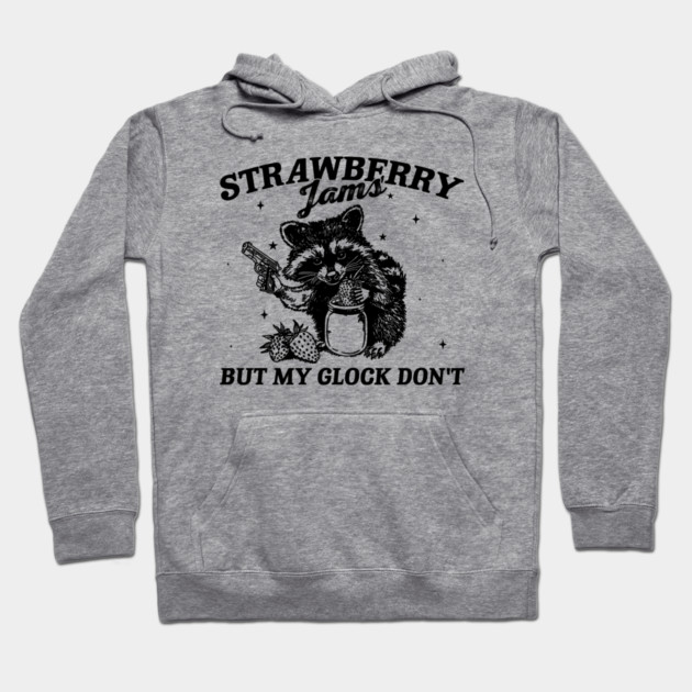 Gray hoodie with "Strawberry Jams But My Glock Don't" graphic, casual style, cotton blend, unisex design.