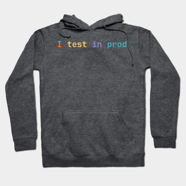Charcoal gray hoodie with "I test in prod" text in colorful font, featuring a cozy style and front pocket.
