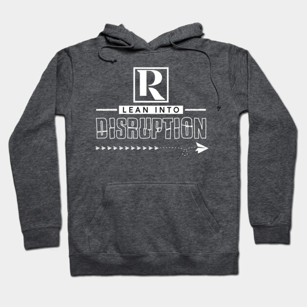 Charcoal gray hoodie with "Lean Into Disruption" text, front pouch pocket, drawstring hood, casual wear.