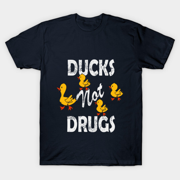 Navy blue t-shirt with "Ducks Not Drugs" text and yellow duck graphics, casual style, cotton material.