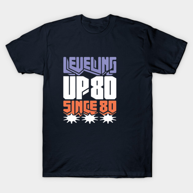 Black "Leveling Up Since 80" graphic t-shirt, casual style, cotton material, ideal for gaming enthusiasts.
