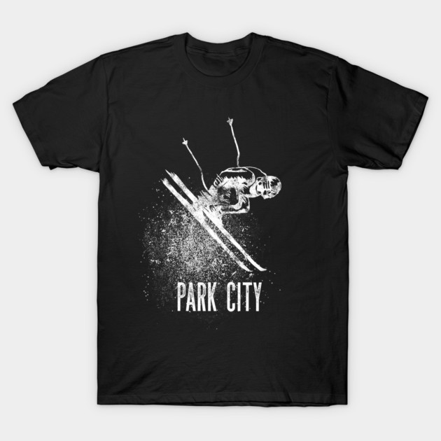 Black t-shirt featuring white skier graphic with "Park City" text, perfect for winter sports enthusiasts. Cotton material.