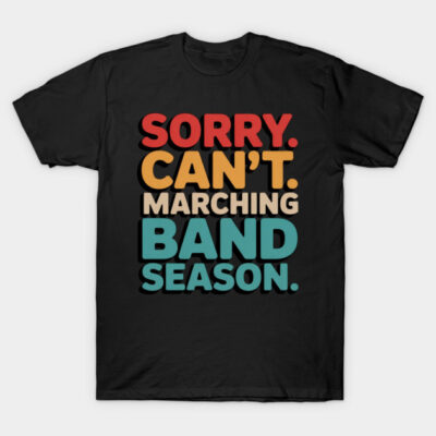 Black t-shirt with colorful "Sorry. Can't. Marching Band Season." text, casual style, cotton material.