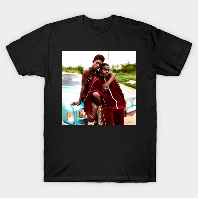 Black cotton t-shirt featuring a vibrant printed image, casual wear, perfect for everyday style and comfort.