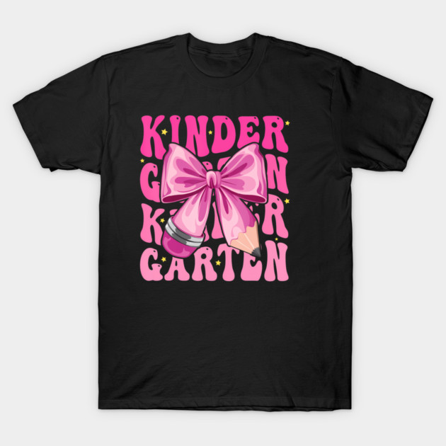 Black T-shirt with pink bow and "Kindergarten" text design, ideal for back-to-school, soft cotton material, casual wear.