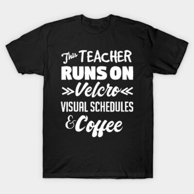 Black teacher-themed T-shirt with white text, "Runs on Velcro, Visual Schedules & Coffee," casual style cotton tee.