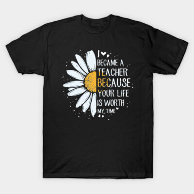 Black cotton T-shirt with white daisy graphic and motivational teacher quote, perfect for educators' casual wear.