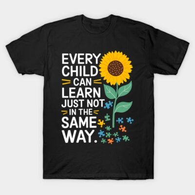 Black t-shirt with sunflower and puzzle design, featuring motivational text for learning diversity.