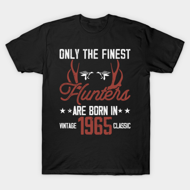 Black vintage-style t-shirt with "Only the Finest Hunters Born in 1965" text and antler graphic, perfect for hunting enthusiasts.