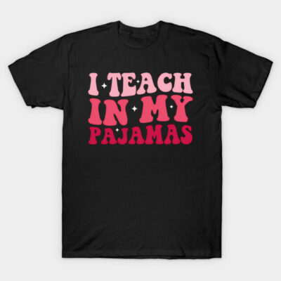 Black cotton t-shirt with "I Teach in My Pajamas" text in pink and red. Casual wear for teachers.