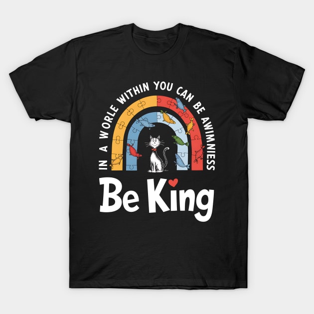 Black t-shirt with colorful rainbow puzzle design featuring a cat and "Be King" text, casual cotton wear.