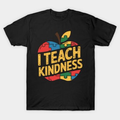 Black "I Teach Kindness" t-shirt featuring colorful puzzle apple design, ideal for educators, 100% cotton casual wear.