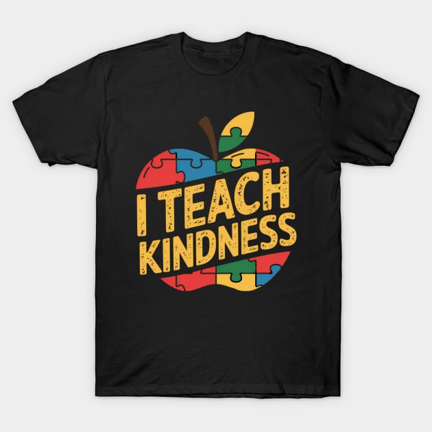 Black "I Teach Kindness" t-shirt featuring colorful puzzle apple design, ideal for educators, 100% cotton casual wear.