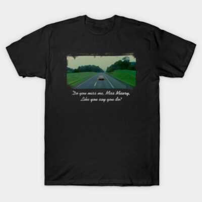 Black cotton t-shirt featuring a scenic road graphic with text, perfect for casual wear and outdoor adventures.