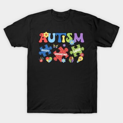 Black T-shirt with colorful puzzle design, featuring "Autism" text and positive words. Cotton, casual wear.