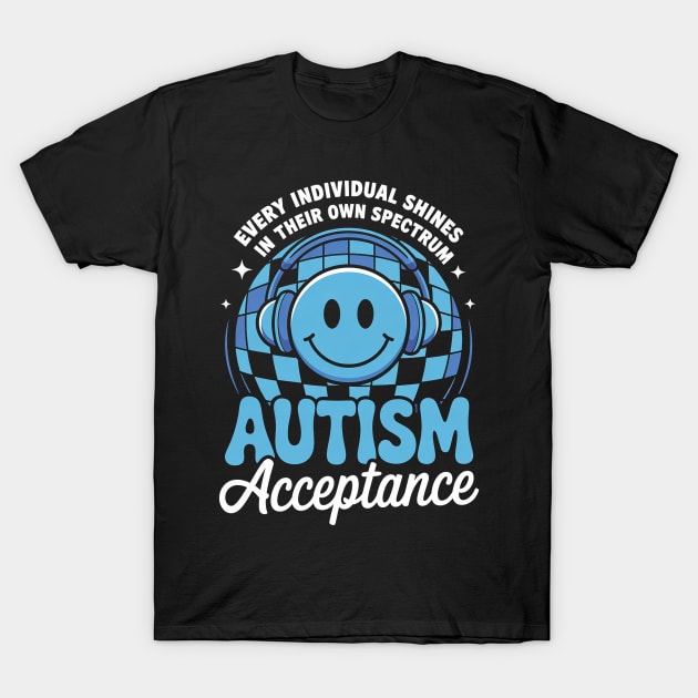 Black T-shirt with blue smiley face and headphones design, promoting autism acceptance with text in white and blue.