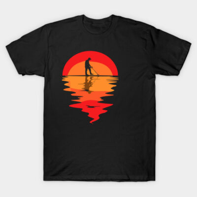 Black t-shirt with sunset paddleboarding design, featuring vibrant red and orange hues, casual cotton wear.