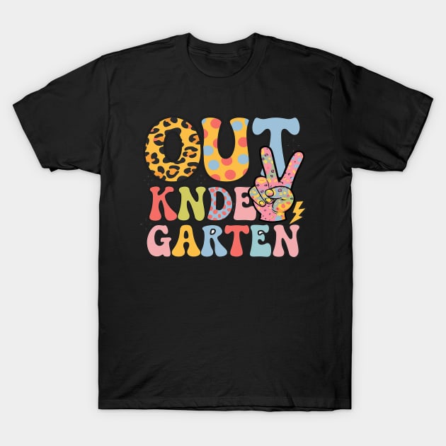 Black t-shirt with colorful "Out Kindergarten" graphic, featuring playful patterns and peace sign design.