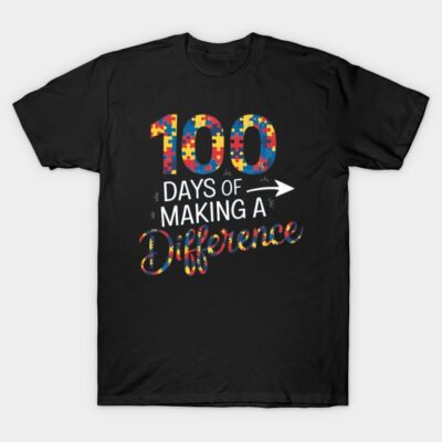 Black t-shirt with colorful "100 Days of Making a Difference" puzzle design, casual style, cotton material.