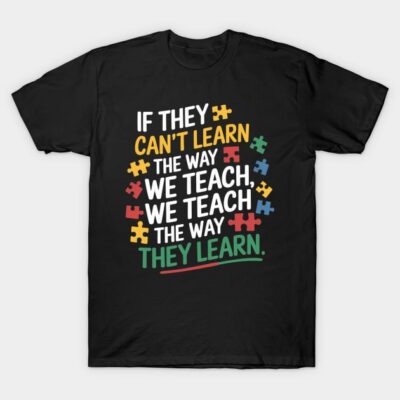 Black t-shirt with colorful puzzle piece design and motivational quote, ideal for educators and casual wear.