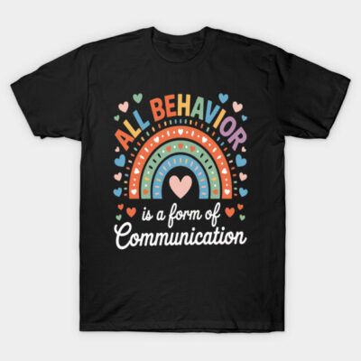 Black T-shirt with colorful rainbow and heart design, featuring the phrase "All Behavior is a Form of Communication."