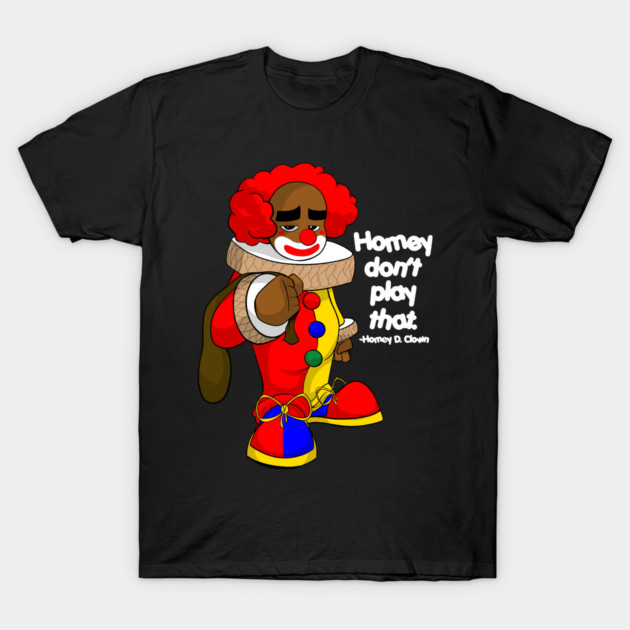 Black t-shirt featuring a colorful cartoon clown design with playful text, ideal for casual wear or gifts.