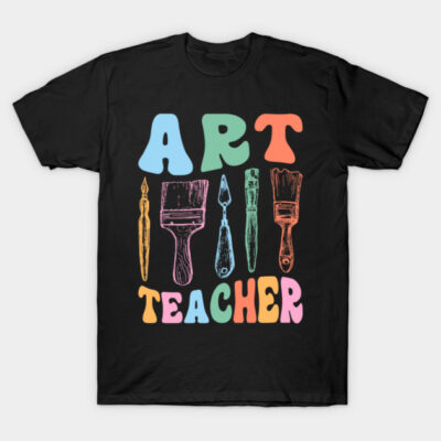 Black t-shirt with colorful "Art Teacher" text and art tool illustrations, perfect for educators and creative enthusiasts.