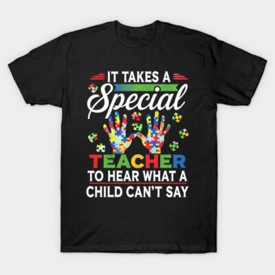 Black T-shirt with colorful puzzle design and motivational teacher quote, perfect for educators. Cotton, unisex fit.