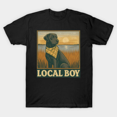 Black t-shirt with "Local Boy" text, featuring a dog in a scenic sunset design, casual style, cotton material.