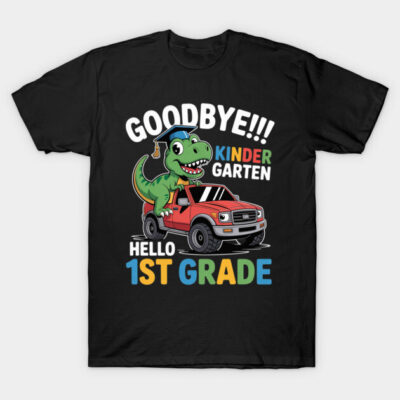 Black t-shirt with cartoon dinosaur, graduation cap, and colorful text "Goodbye Kindergarten, Hello 1st Grade."