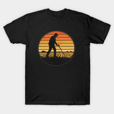 Black T-shirt with retro sunset and metal detecting silhouette print, casual style, cotton material.