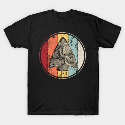 Black T-shirt with vintage arrowhead graphic, multicolor striped background. Casual style, cotton material.