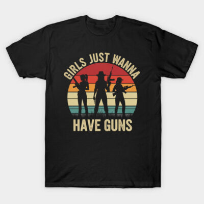 Black t-shirt with retro sunset design and "Girls Just Wanna Have Guns" slogan, casual wear.