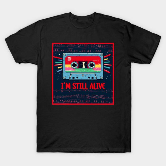 Black t-shirt with colorful cassette tape graphic and "I'm Still Alive" text, casual retro style, unisex cotton blend.