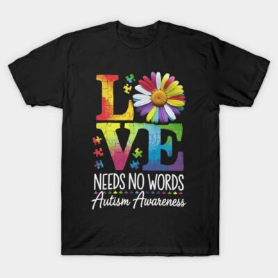 Black T-shirt with colorful "Love Needs No Words" puzzle design, Autism Awareness theme, unisex casual wear.