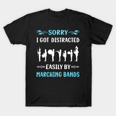 Black T-shirt with marching band graphic and "Sorry I Got Distracted Easily by Marching Bands" text, casual wear.