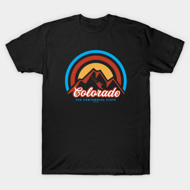 Black t-shirt with retro Colorado mountain design, featuring colorful sunset graphic. Casual wear, cotton material.