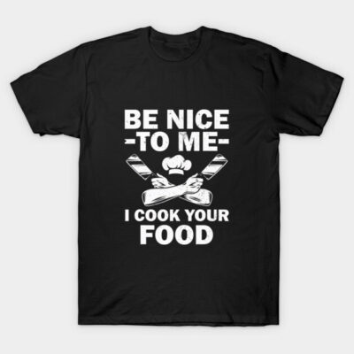 Black T-shirt with "Be Nice to Me, I Cook Your Food" white text and chef graphic, casual style, cotton material.