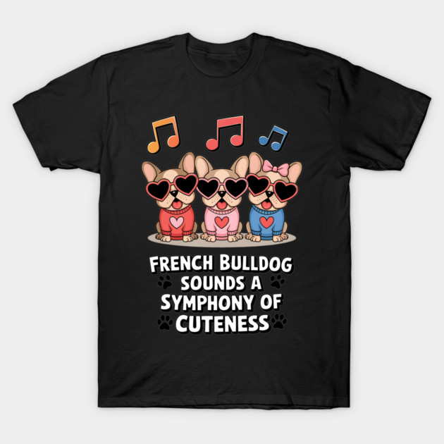 Black T-shirt featuring cartoon French Bulldogs with musical notes, heart sunglasses, and text "Sounds a Symphony of Cuteness."