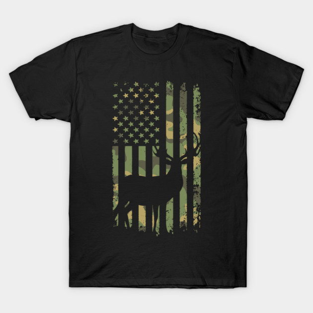 Black t-shirt with camo American flag and deer silhouette design; casual wear, cotton material, patriotic style.