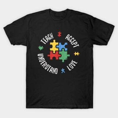 Black t-shirt with colorful puzzle pieces and motivational words design, ideal for casual wear and awareness support.