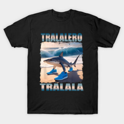 Black t-shirt featuring a shark wearing blue shoes, ocean background, "Tralalero Tralala" text, casual style.